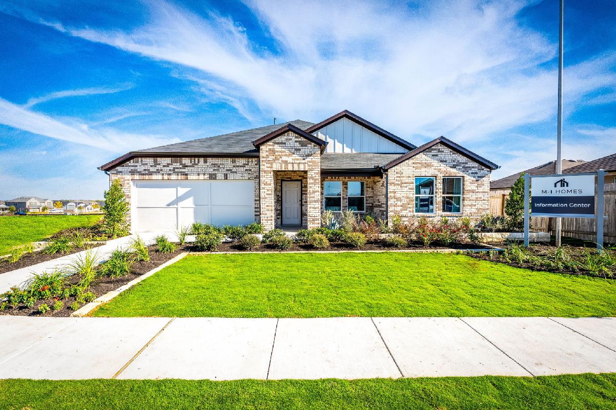This is the front exterior of the Hawkins plan. This is the model home located in Carillon at 133...