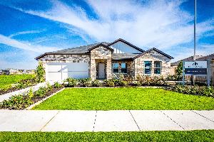 This is the front exterior of the Hawkins plan. This is the model home located in Carillon at 133...