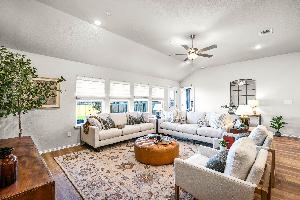 This is the living area of the Hawkins plan and is the model home in Carillon at 13305 Eppright T...