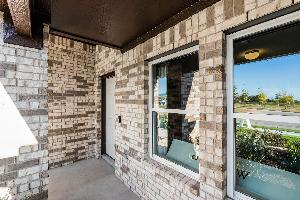 This is the front exterior of the Hawkins plan. This is the model home located in Carillon at 133...