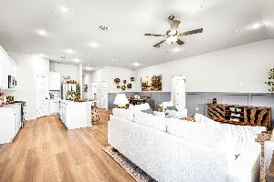 This is the living area of the Hawkins plan and is the model home in Carillon at 13305 Eppright T...