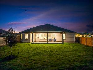 This is the back exterior of the Hawkins plan and is the model home in Carillon at 13305 Eppright...