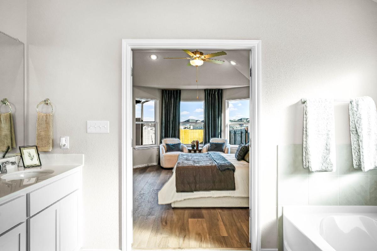 This is the primary bathroom of the Hawkins plan and is the model home in Carillon at 13305 Eppri...