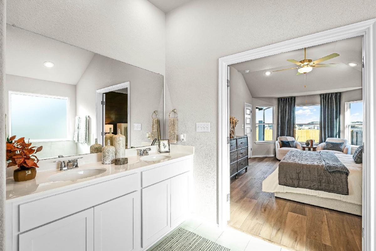 This is the primary bathroom of the Hawkins plan and is the model home in Carillon at 13305 Eppri...