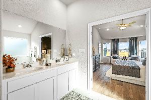 This is the primary bathroom of the Hawkins plan and is the model home in Carillon at 13305 Eppri...