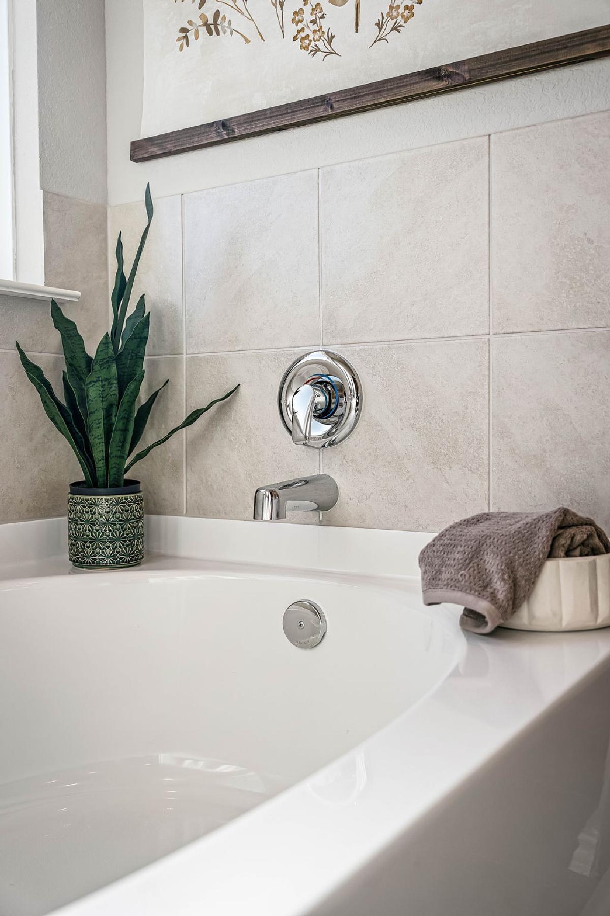 This is the primary bathroom of the Hawkins plan and is the model home in Carillon at 13305 Eppri...