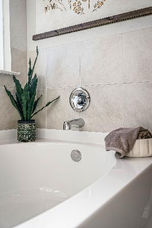 This is the primary bathroom of the Hawkins plan and is the model home in Carillon at 13305 Eppri...