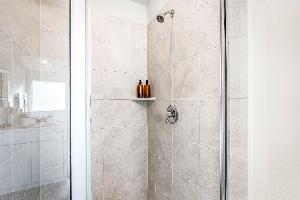 These are images of the secondary bathrooms in the Hawkins plan and is the model home in Carillon...