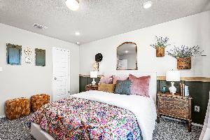These are the secondary bedrooms of the Hawkins plan and is the model home in Carillon at 13305 E...