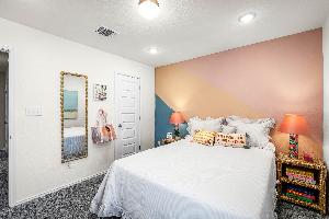 These are the secondary bedrooms of the Hawkins plan and is the model home in Carillon at 13305 E...