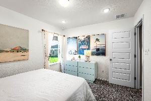 These are the secondary bedrooms of the Hawkins plan and is the model home in Carillon at 13305 E...