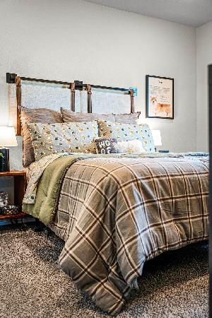 These are the secondary bedrooms of the Hawkins plan and is the model home in Carillon at 13305 E...