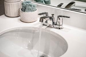 This is the primary bathroom of the Hawkins plan and is the model home in Carillon at 13305 Eppri...